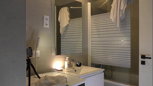 Long legs hot college girl Alicia in her plaid school uniform mini skirt and stockings in the bathroom