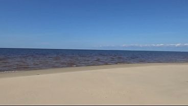 Funny milf with nylon ass and tits on beach