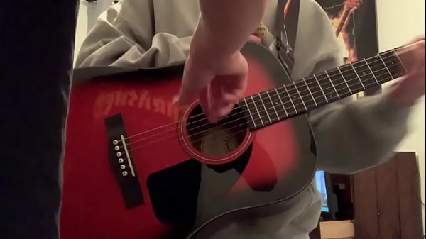 white boy fingers the guitarist of 7pm on a fridays guitar