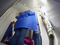 girl in the changing room of a shopping center