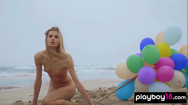 Skinny Italian MILF blondie Farncy Torino plays with balloons on the beach